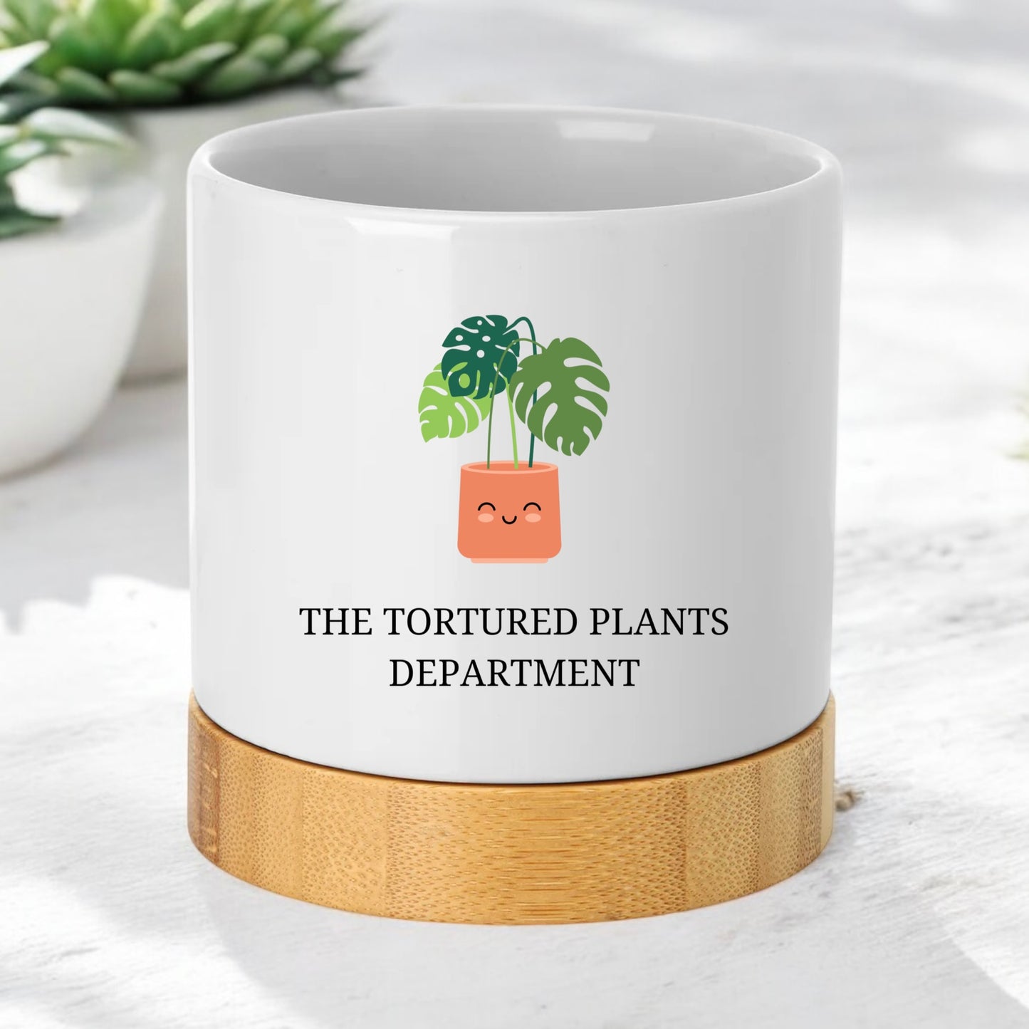 Tortured Plants Department pot with bamboo base